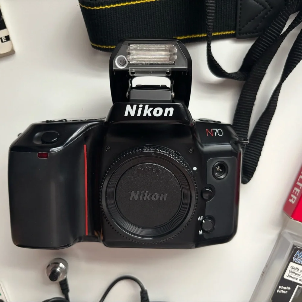 Nikon N70 SLR Camera Body with Branded Strap and Accessories
